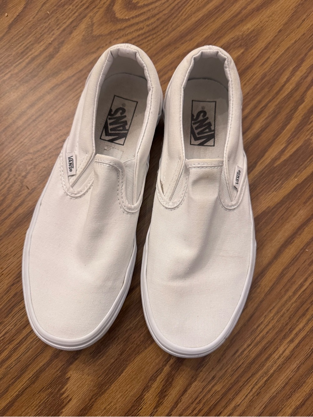 Vans Slip-On Canvas Sneakers in White